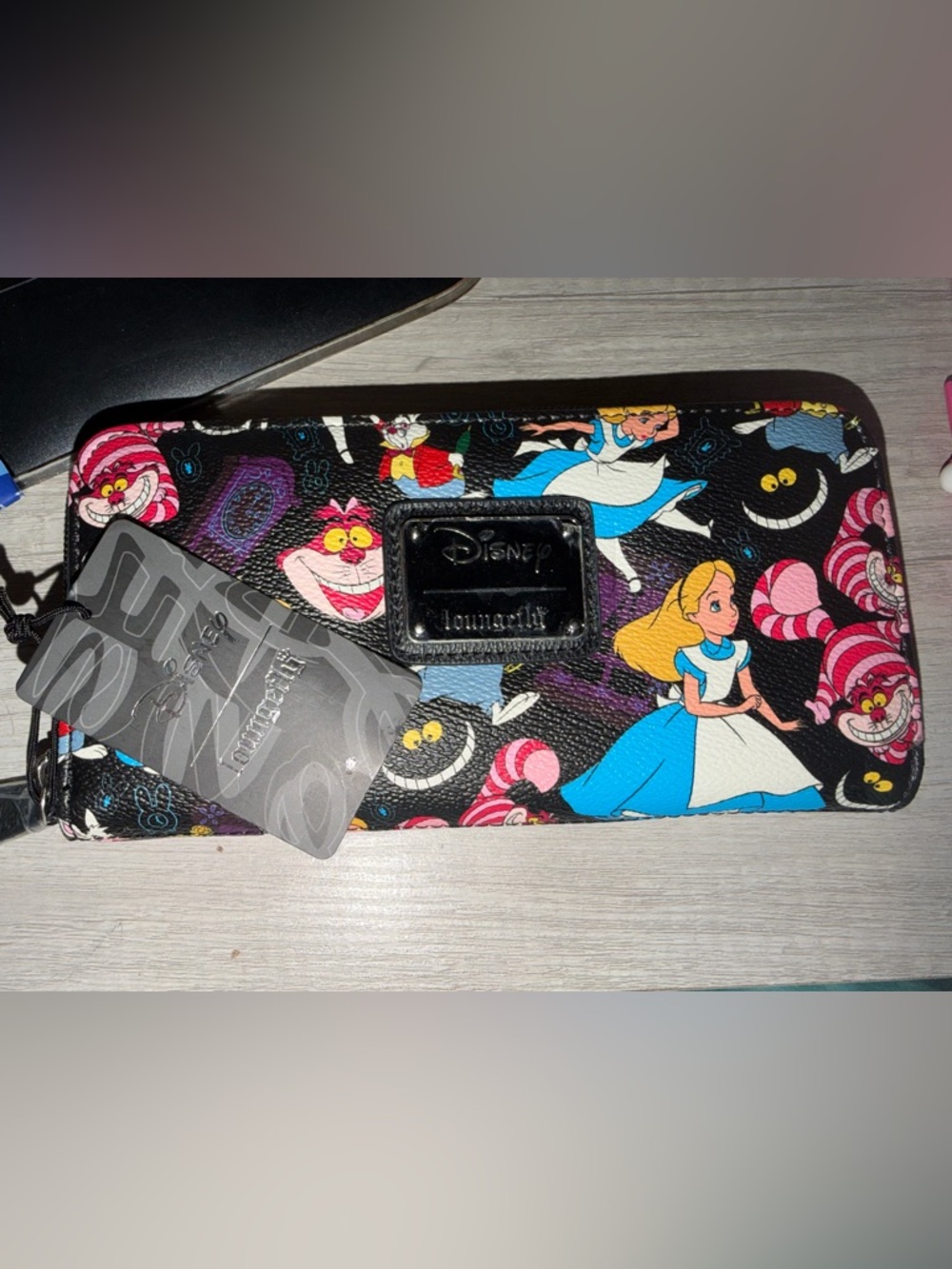 NWT Loungefly Alice in Wonderland wallet.